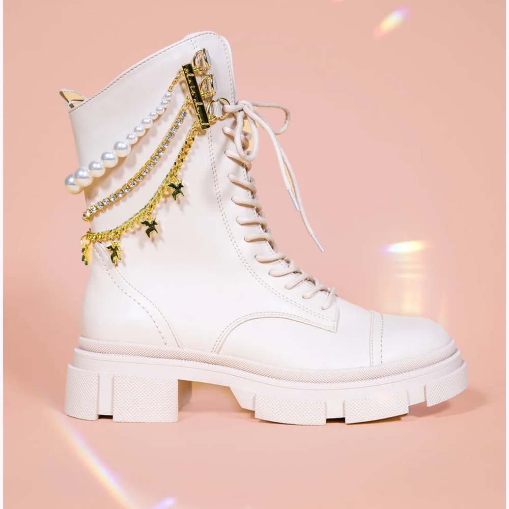 Elegant White Lace-Up Boots with Gold Accents
